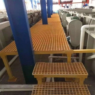 Fiberglass platform deck made of FRP grating in chemical processing facility Fiberglass platform deck made of FRP grating in chemical processing facility